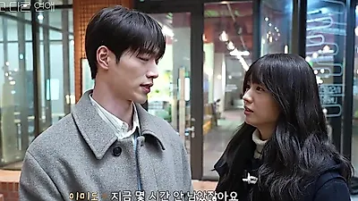 Namgoong and Mido sort through old photos in A Love Other Than Yours